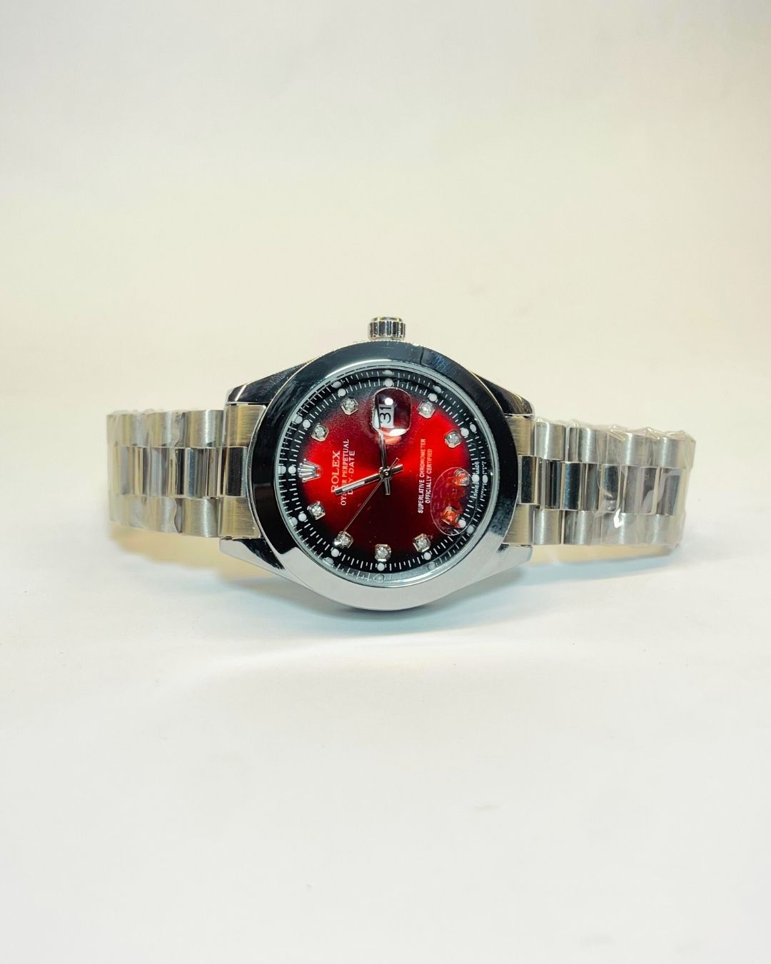 Rolex-Inspired Silver Watch with Ruby Red Dial Stainless Steel – Elegant, Comfortable & Premium | FineOclock