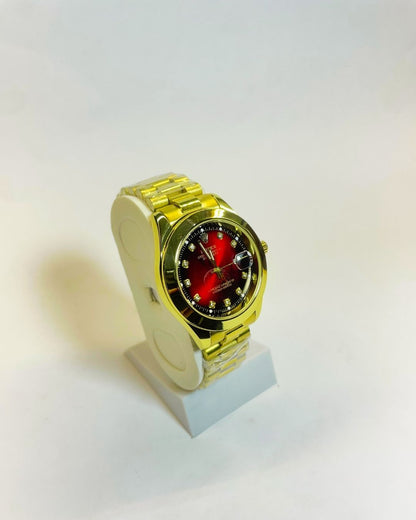 Rolex-Inspired Golden Watch with Crimson Red Dial Stainless Steel – Elegant, Comfortable & Premium | FineOclock